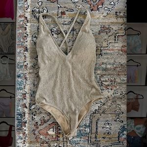 Gold one-piece swimsuit